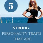 woman standing by water-strong personality traits blog post
