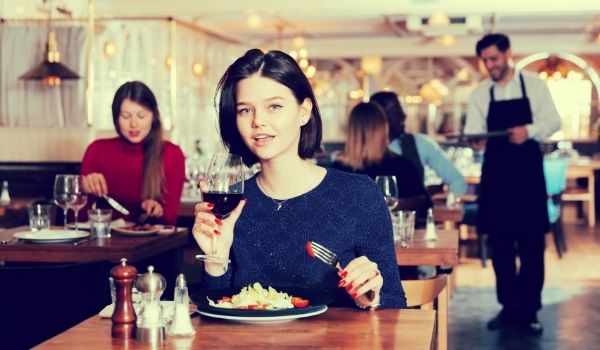 woman eating alone for Christmas dinner