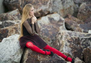 woman sitting on rock-how to find self love