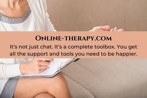 woman sitting talking to a therapist-going through a breakup blog post