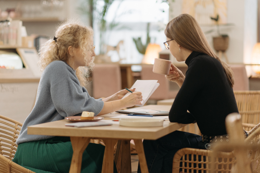 Two women talking to each other