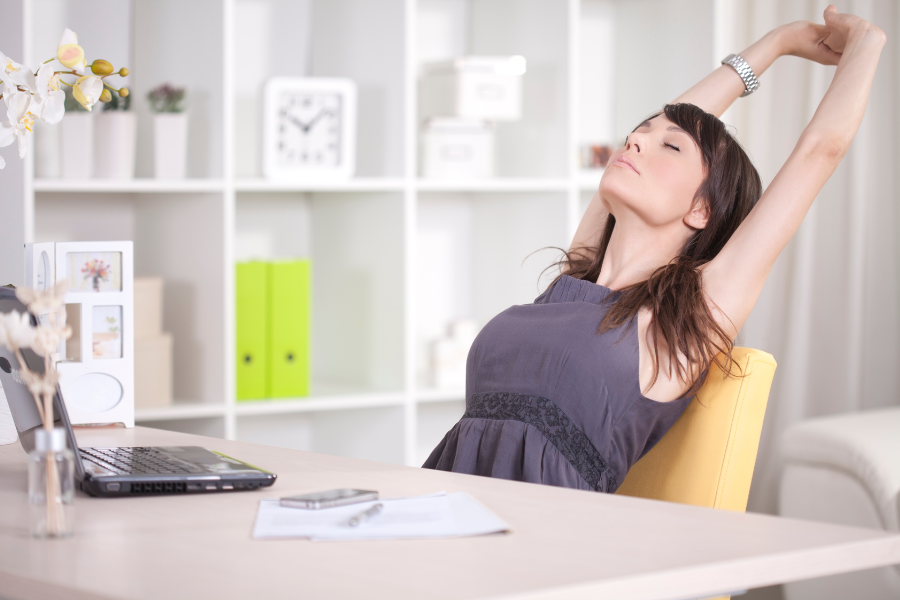 A woman taking a break from work to be more productive