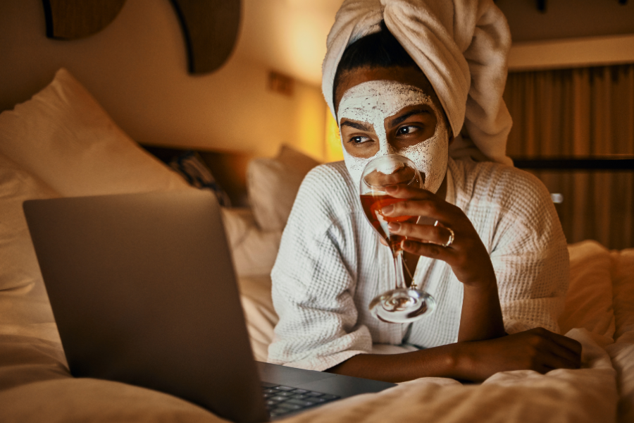 A woman with a face mask, spending some me-time