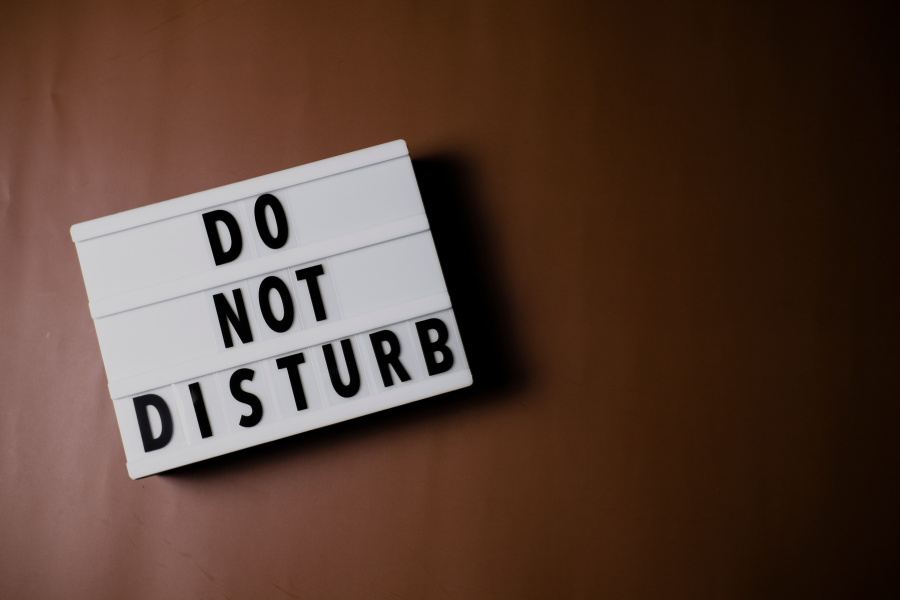 A sign that says "do not disturb"