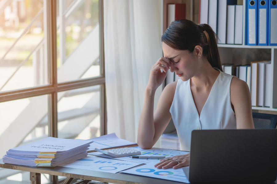 A woman feeling bored at work #WorkplaceDepression #Depression
