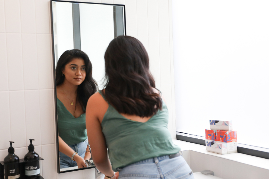 A woman looking at herself in the mirror A poster about strategies after leaving a relationship with a narcissist #NarcissisticAbuse #RelationshipWithANarcissist