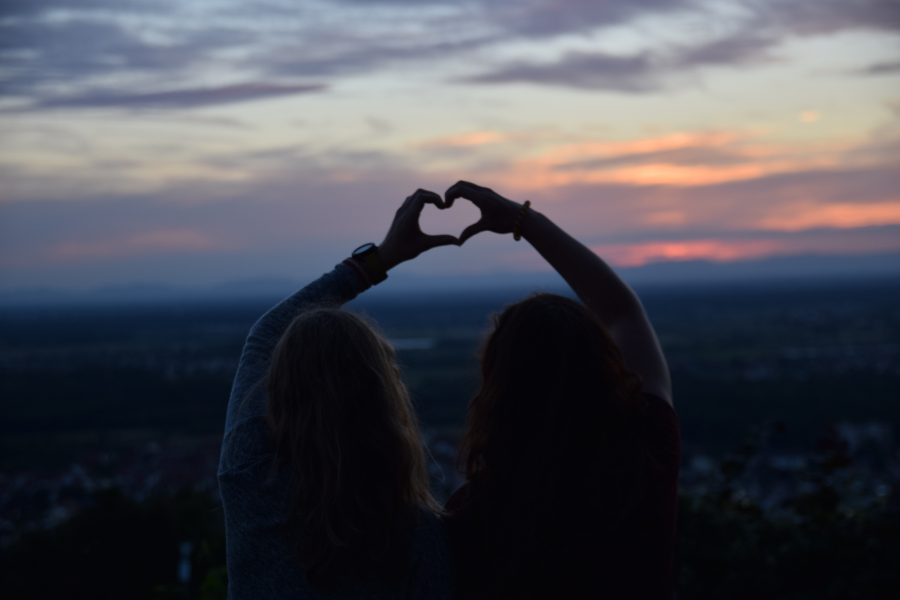 Two friends forming the heart symbol A group of friends having fun #GoodFriend #QualitiesOfAGoodFriend