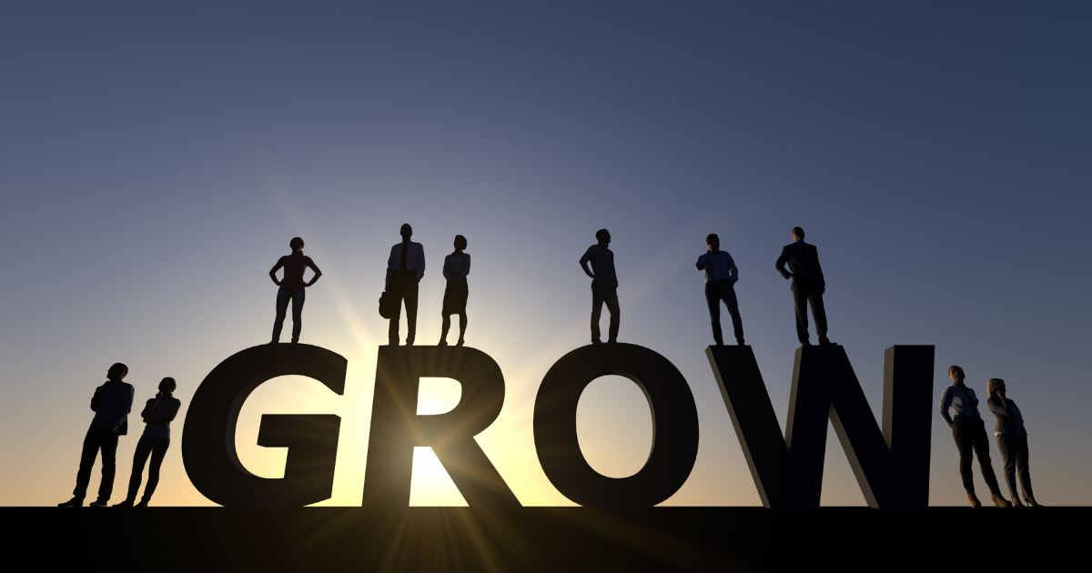A group of people standing around the word "grow" #EmpoweringQuotes #PersonalGrowth