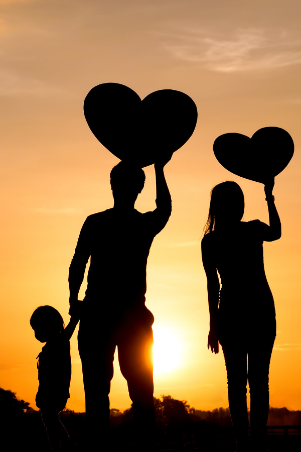 A silhouette of a family by the sunset A poster about heartfelt family love letter #FamilyLove #FamilyFirst