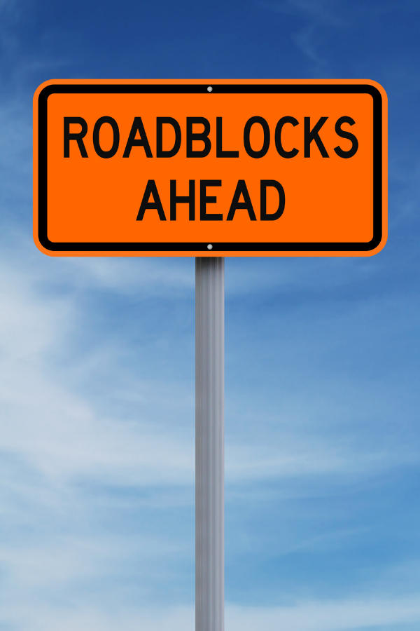 A signage signaling roadblocks ahead #GrowthMindset #BrightFuture