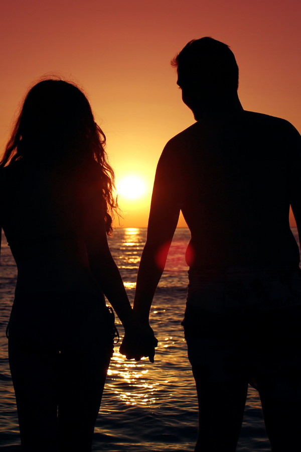 A couple holding hands by the beach #LoveLanguage #LoveIsEverywhere