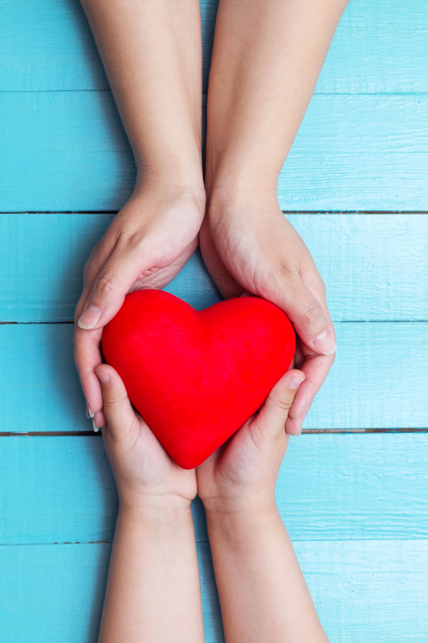 Two people holding together a heart symbol #NoMeansNo #SettingBoundaries