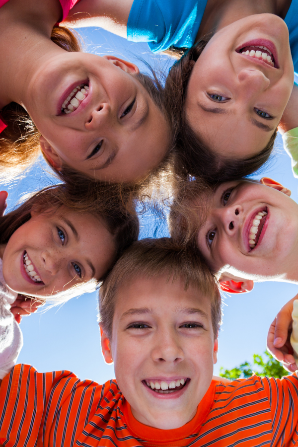 A group of children smiling for Inspirational Life Lessons From Children #InspirationalLessons #LifeLessons