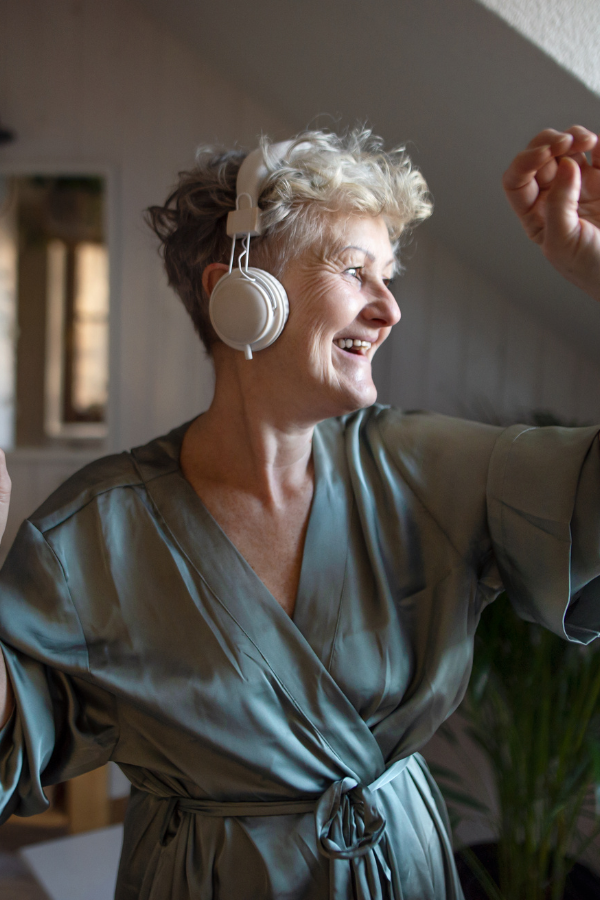 An elderly woman listening to music as a form of self-care #NoMeansNo #SettingBoundaries