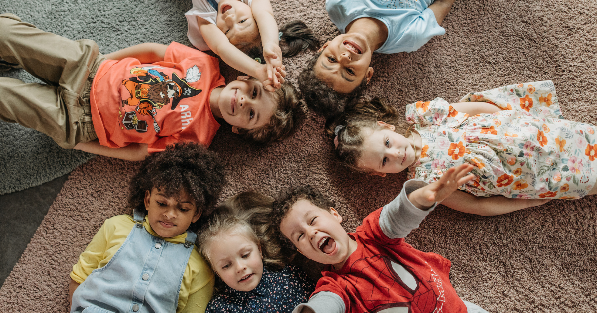 A group of children laying down and having fun #InspirationalLessons #LifeLessons