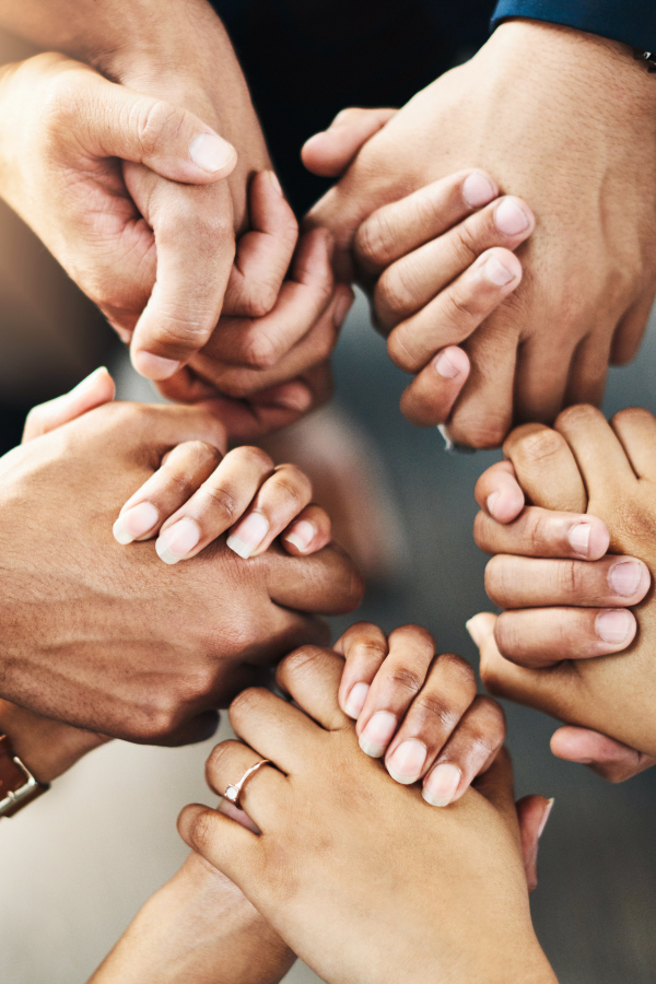 A group of people holding each others' hands A poster about quotes on altruism #QuotesThatInspire #Altruism