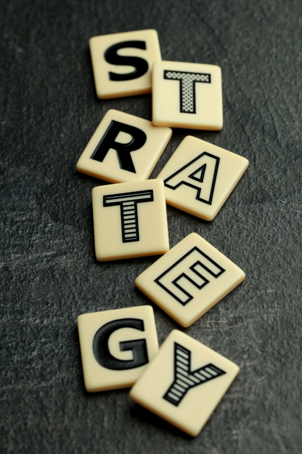 Scrabble letters spelling out "strategy" #FindProductivity #BoostYourProductivity