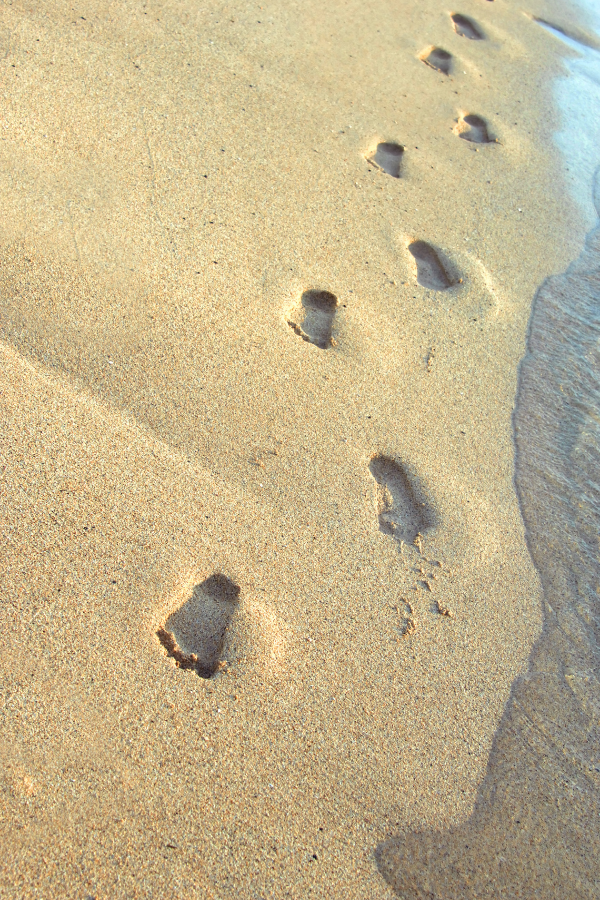 A path of someone's steps along the beach #EmbraceChange #TransformYourLife