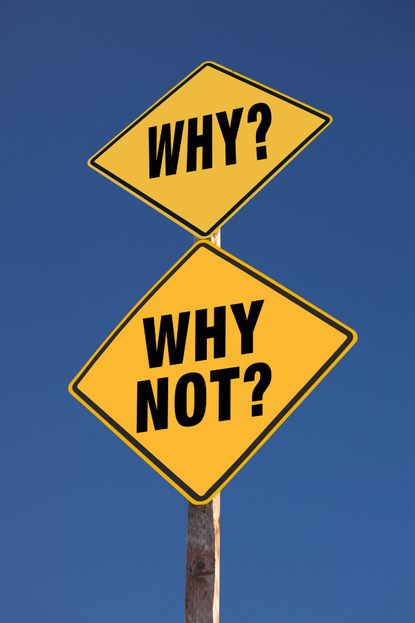 A road sign asking "why?" and "why not?" #PowerOfConsistency #ConsistencyPaysOff