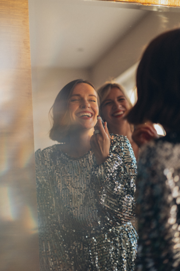 Two women happily looking at the mirror #GrowingUp #AdultLife