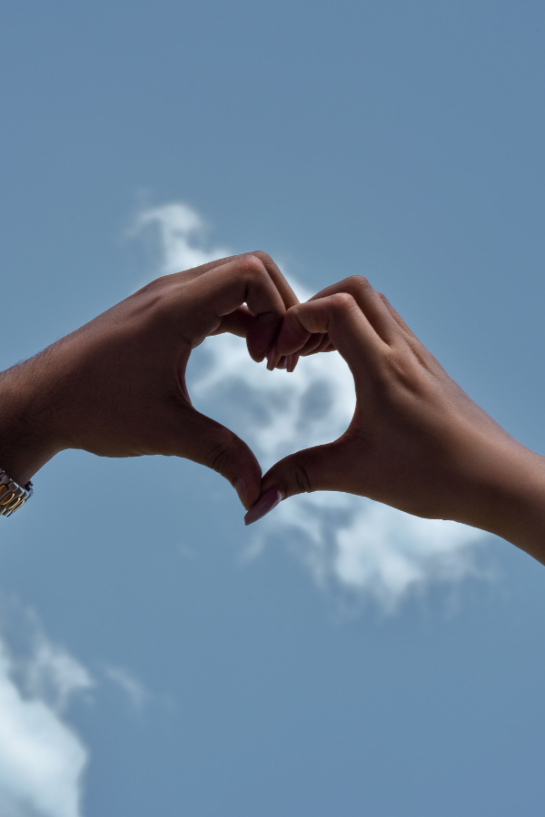 A person forming the heart symbol against the sky #Vulnerability #RelationshipVulnerability