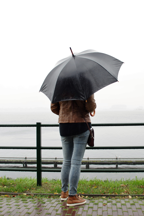 A woman holding an umbrella #RomanticizingLife #RomanticizieYourLife