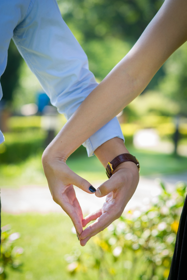 A couple forming a heart with their hands #LoveOrInfatuation #InfatuationVsLove