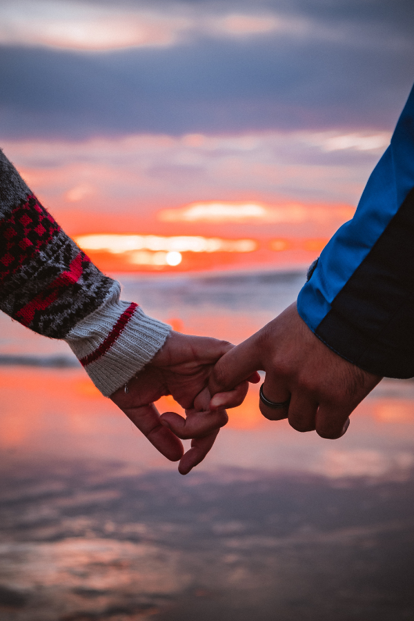 A couple interlinking their fingers #LoveOrInfatuation #InfatuationVsLove