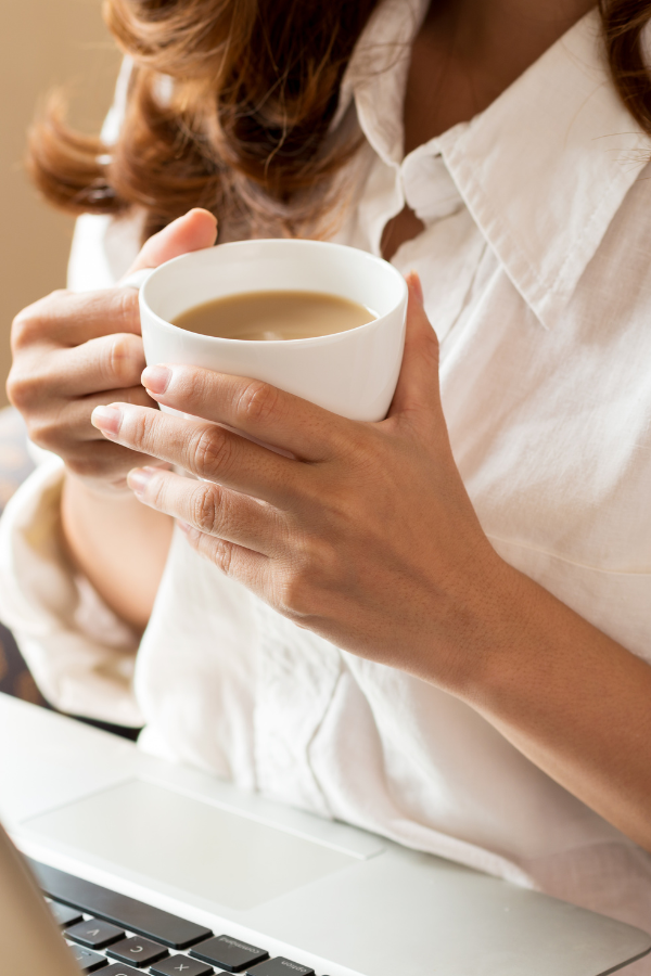 A woman holding a cup of coffee #RomanticizingLife #RomanticizieYourLife