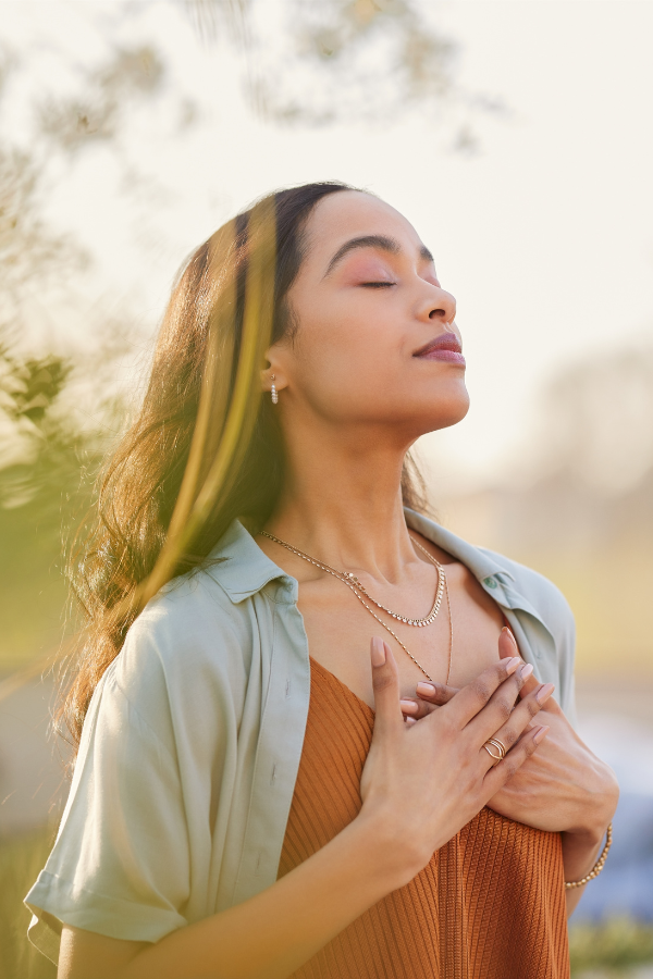 A woman practicing deep breathing exercises #LetGoOfAnger #SayNoToAnger