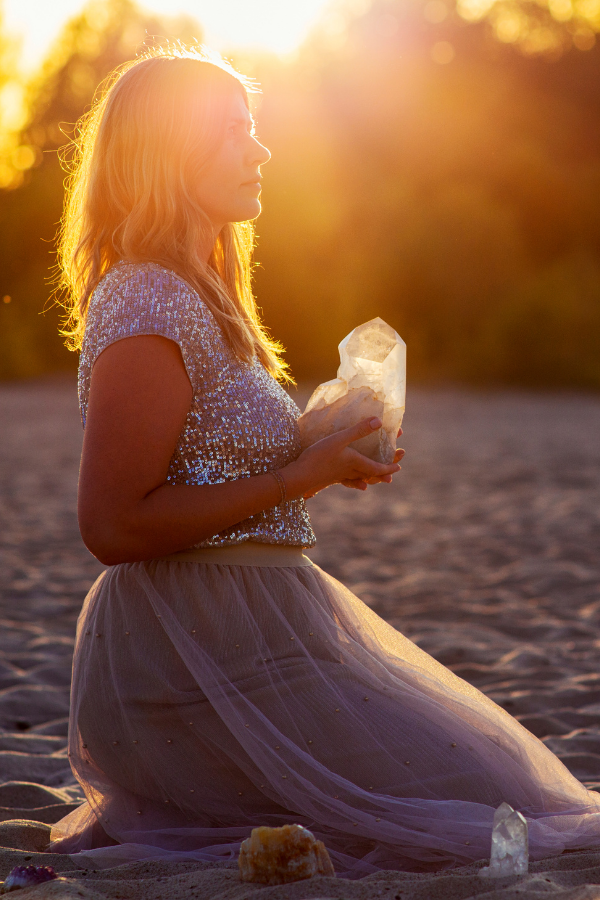 A woman feeling relaxed and healed and in her magnetic energy