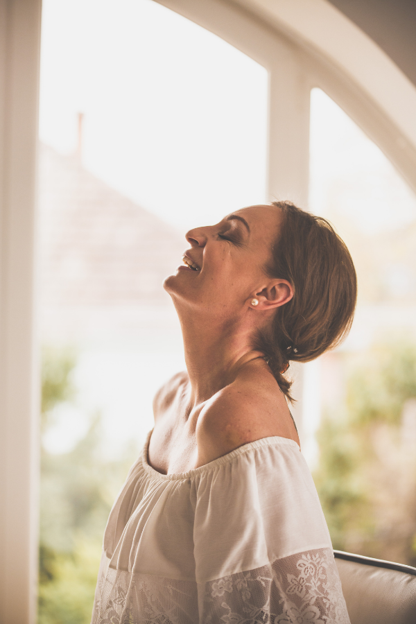 A confident woman laughing