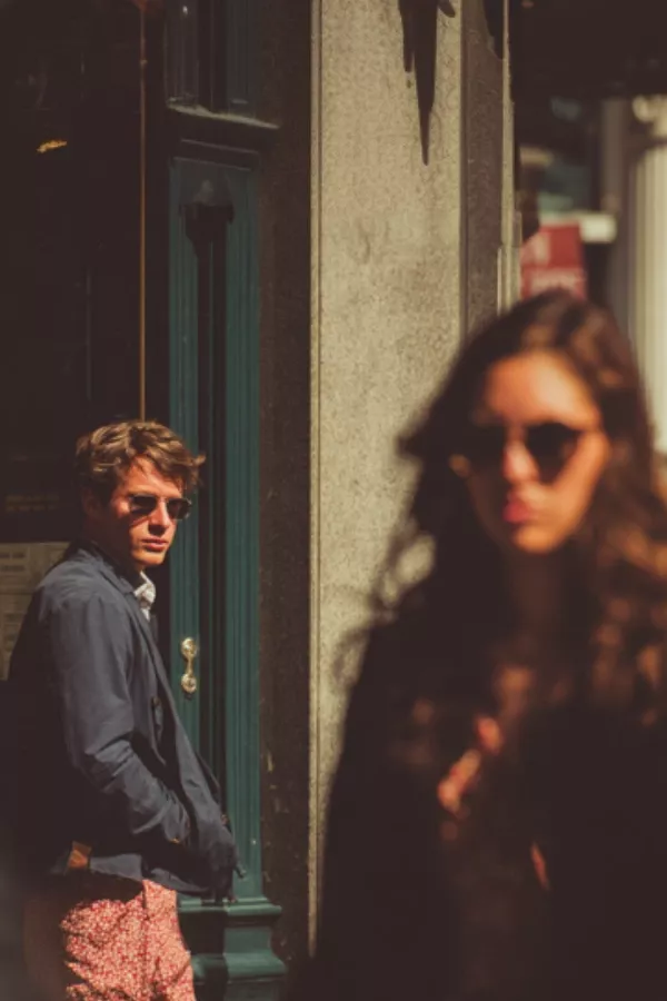 Man looking at another woman, highlighting subtle betrayal