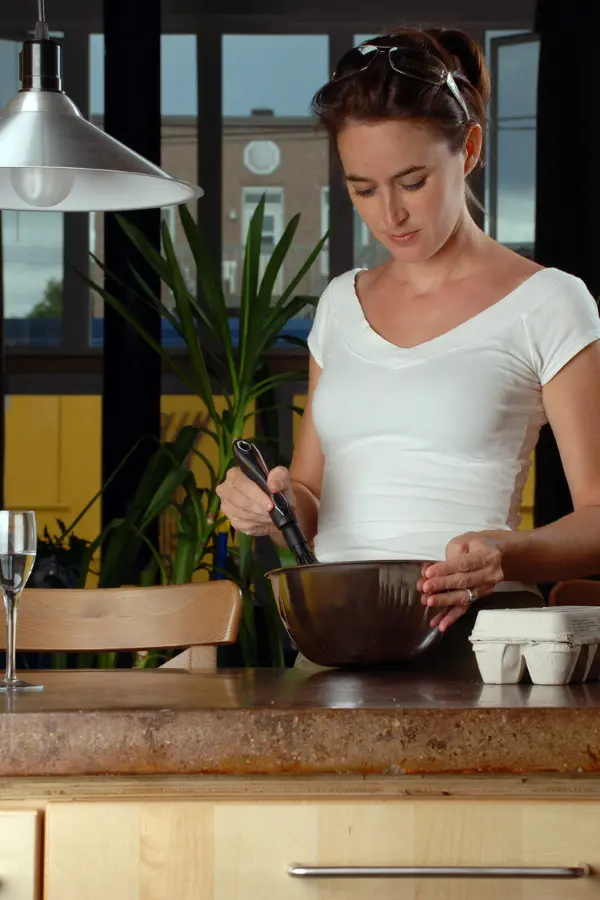 A woman cooking in the kitchen