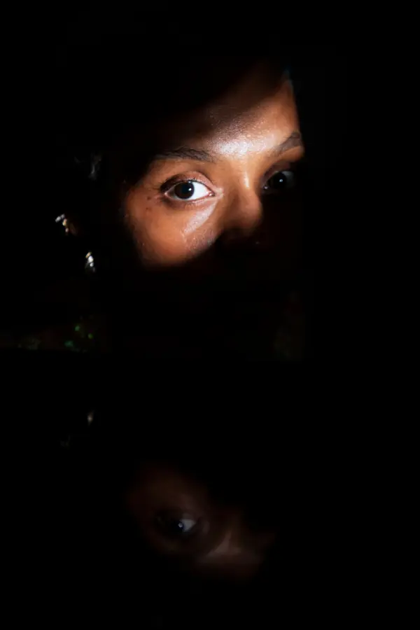 A woman looking directly at the camera