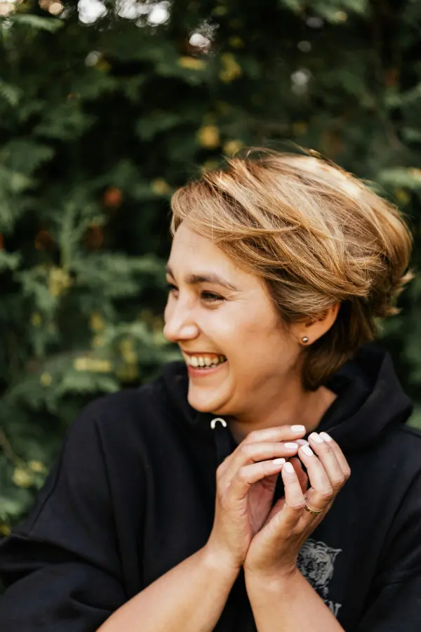 A woman smiling