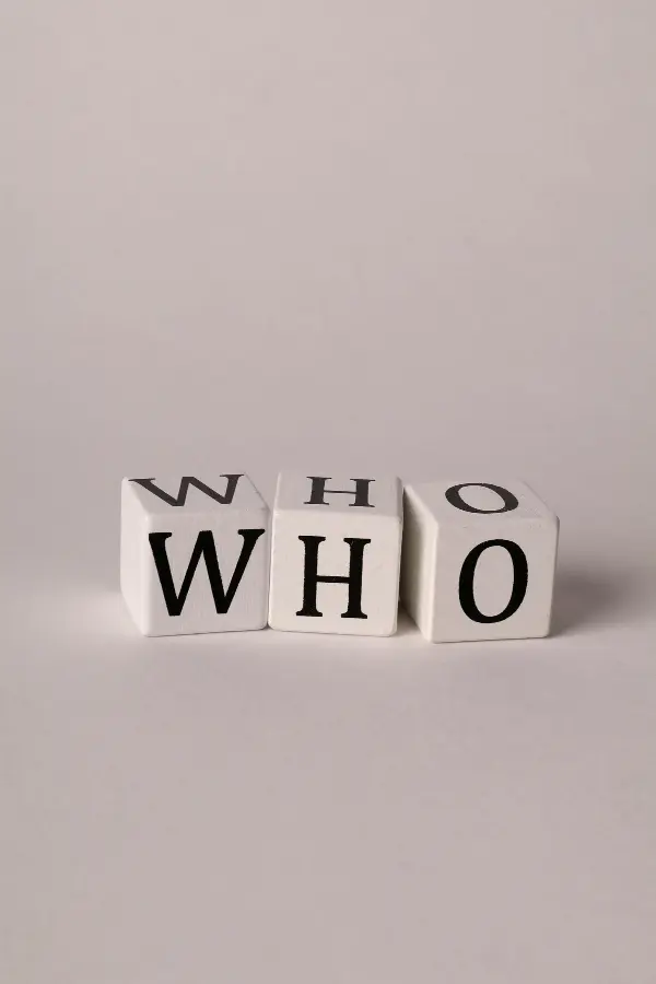 Dice spelling out "who"
