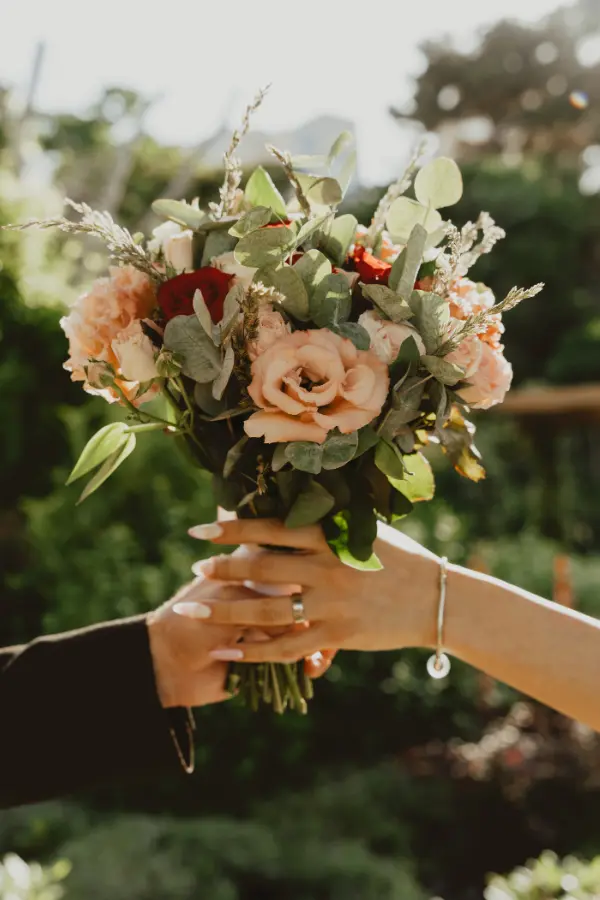 A man giving flowers to a woman