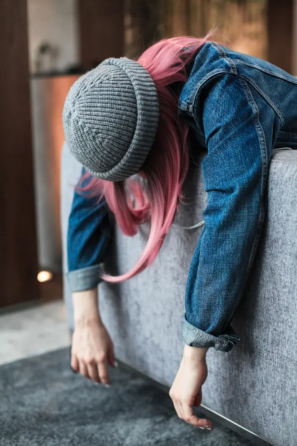 A woman feeling emotionally exhausted